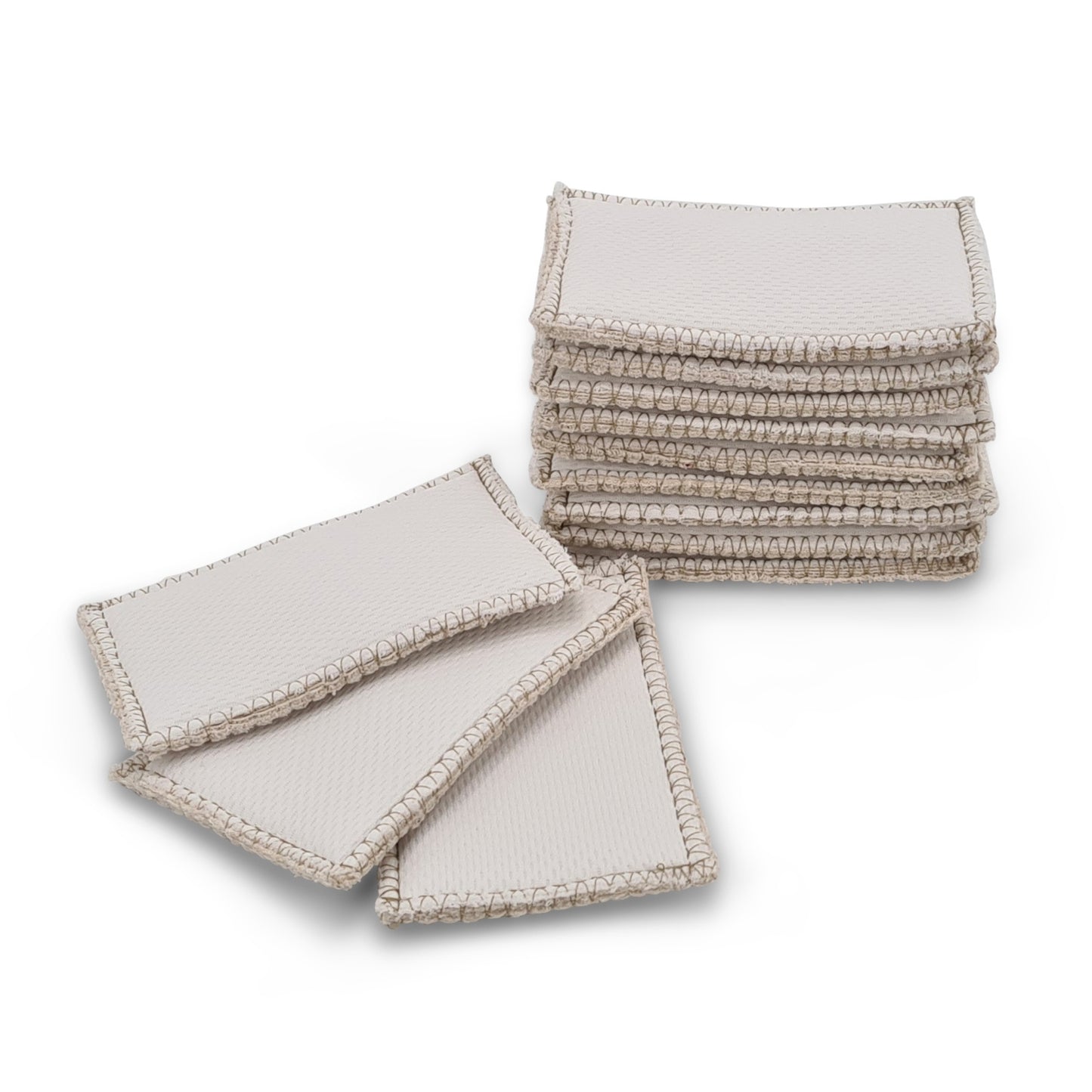 Set aus 12 Saugeinlagen für die Inkontinenzhose für Hunde. 9 Saugeinlagen sind übereinander geschichtet, 3 Saugeinlagen liegen aufgefächert davor.